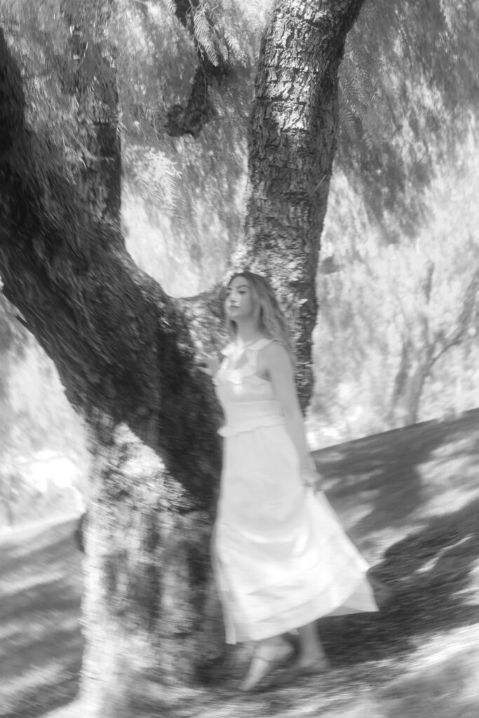 Blurry photo of a woman, symbolizing the fear, confusion, and hidden trauma of childhood abuse.